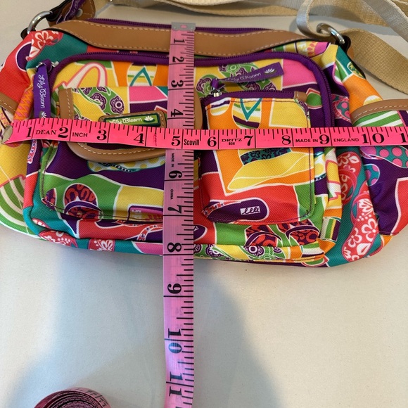 Lily Bloom cross-body purse with flip-flops and sun hats.Size 10 by 8 inches - Picture 4 of 8